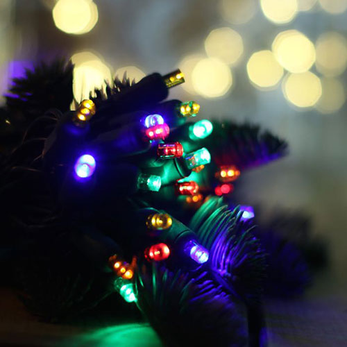 closeup of tiny multi colored christmas lights